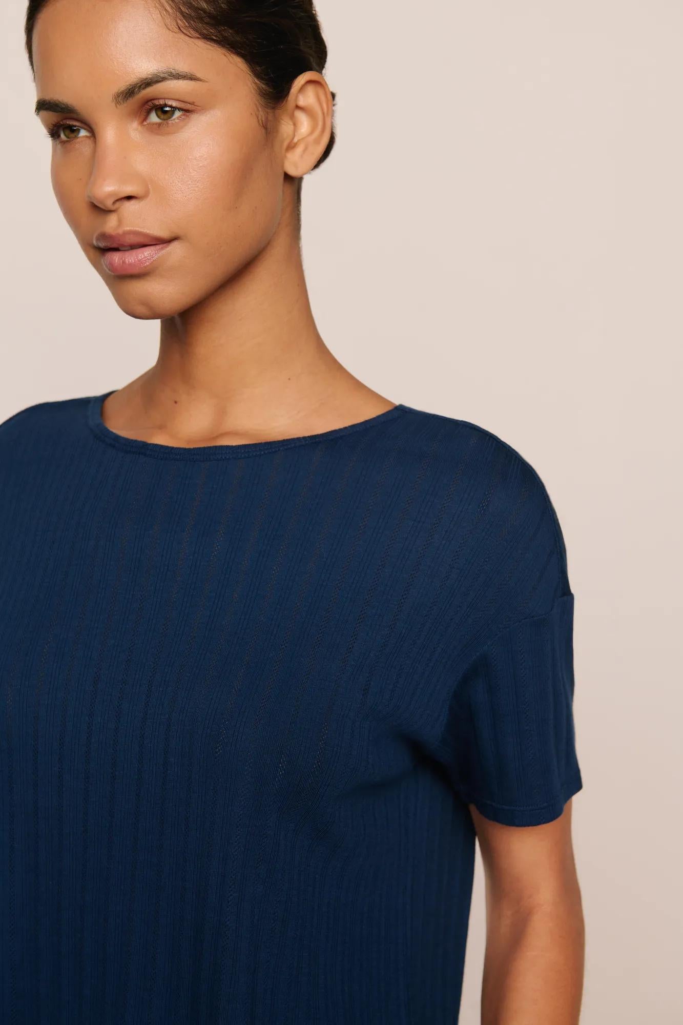 Model is wearing Pointelle Short Sleeve Tee  in Navy