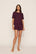 Model is wearing Pointelle Short in Wildberry