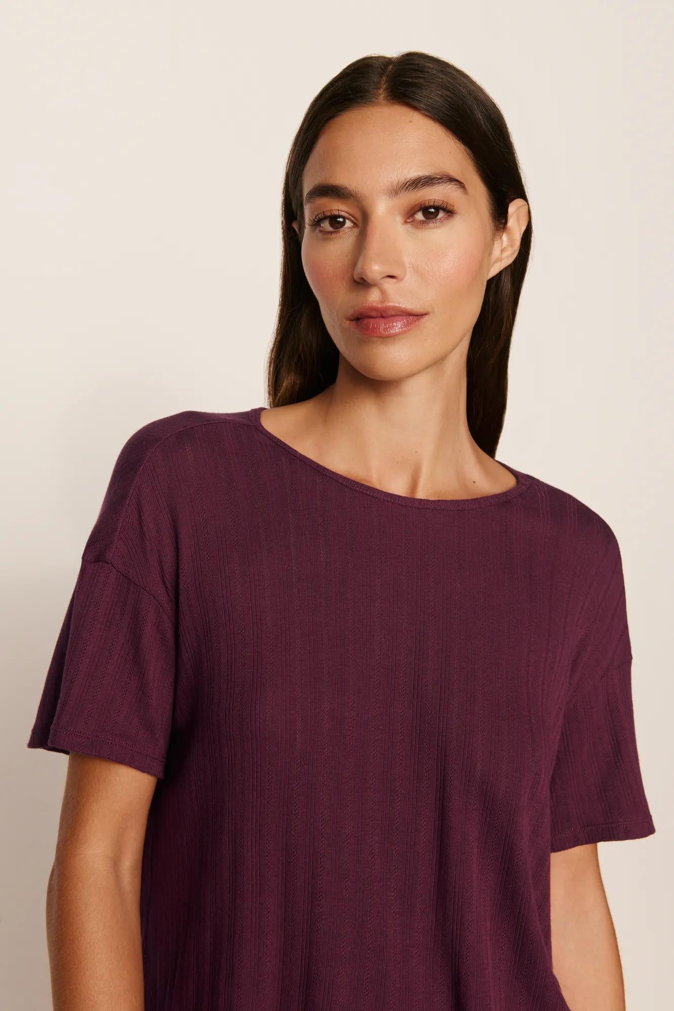 Model is wearing Pointelle Short Sleeve Tee in Wildberry