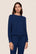 Model is wearing Cozy Time Crew Neck Pullover  in Navy