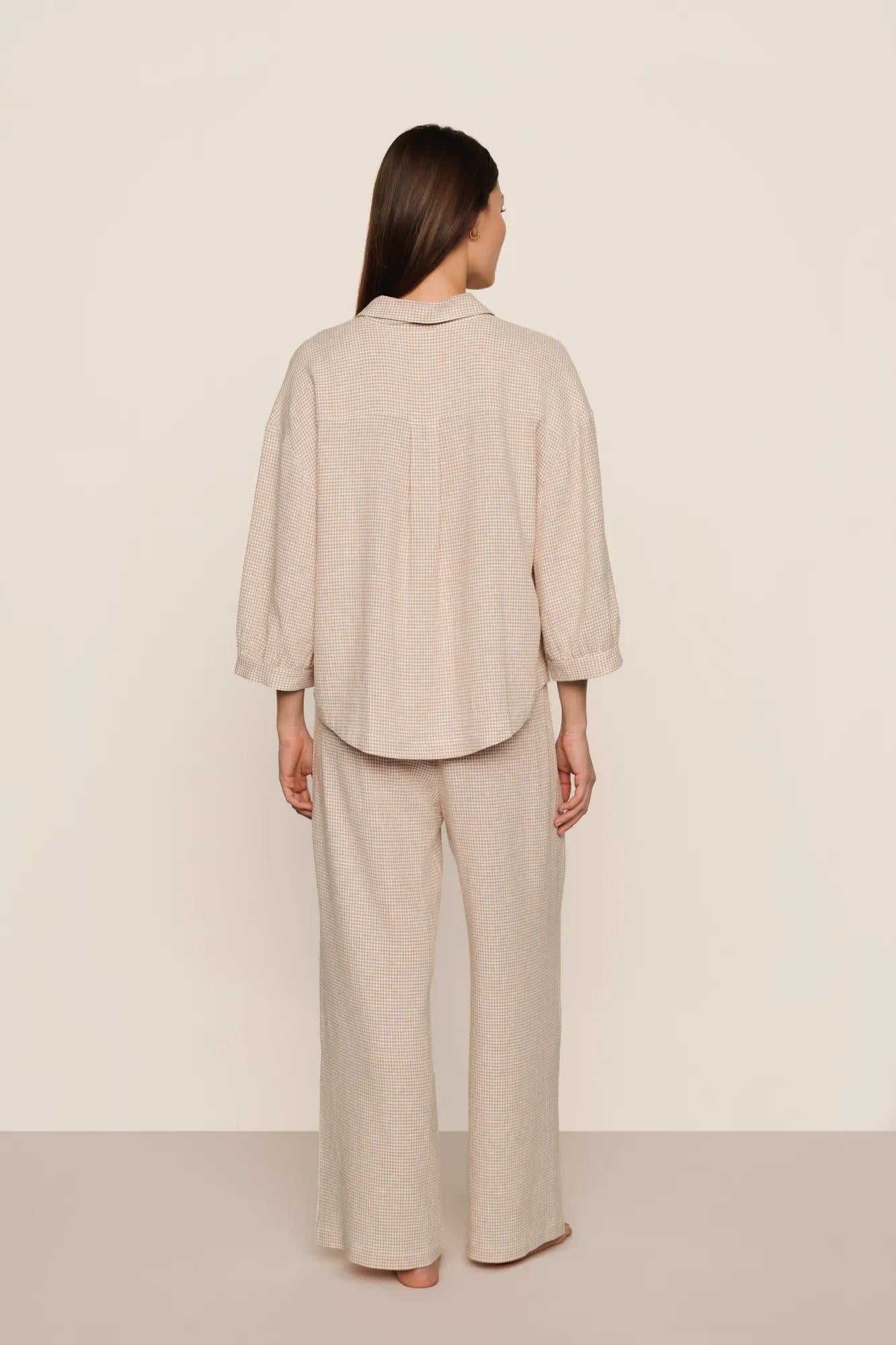Model is wearing Linen Blend Relaxed Quarter Sleeve Top in Gingham White/Warm Taupe