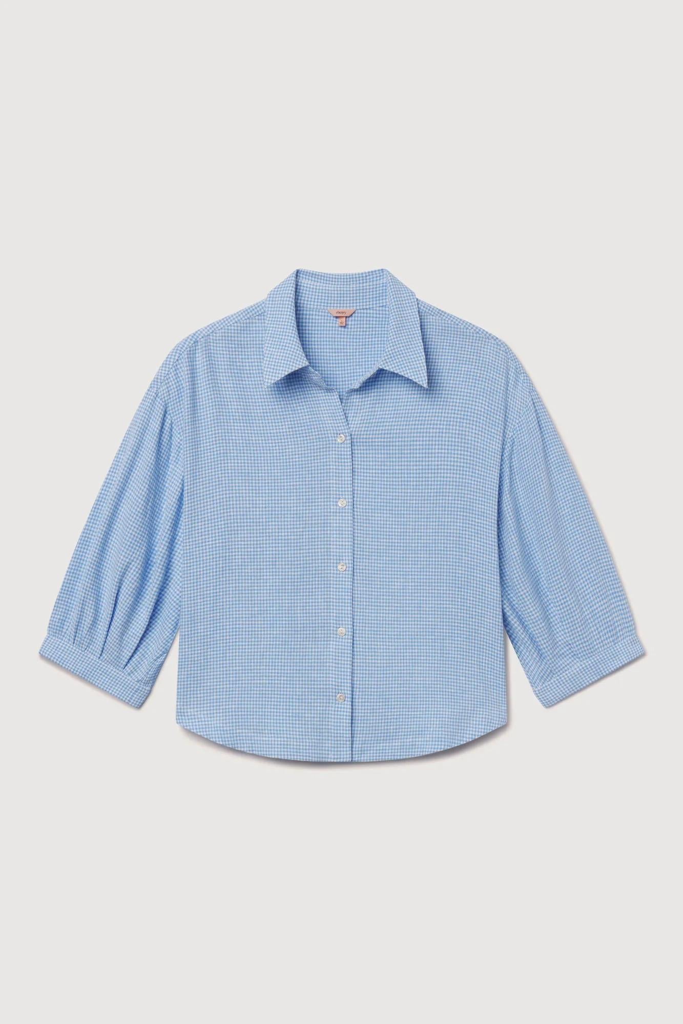 Model is wearing Linen Blend Relaxed Quarter Sleeve Top in Gingham White/Summer Blue