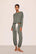 Model is wearing Gisele TENCEL™ Modal Slouchy PJ Set  in Smokey Olive/Ivory