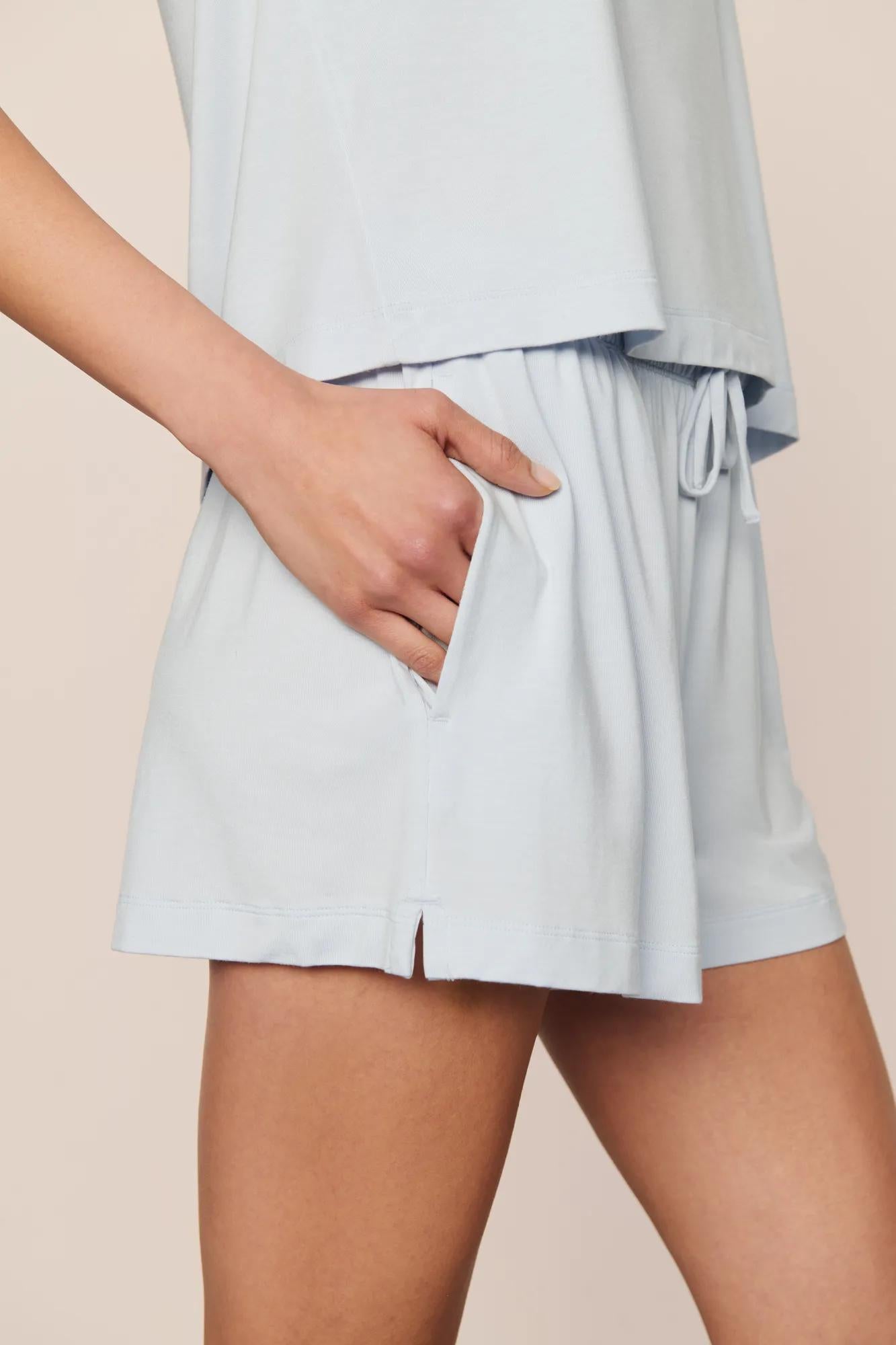 Model is wearing Gisele TENCEL™ Modal Everyday Relaxed Short  in Ice Blue