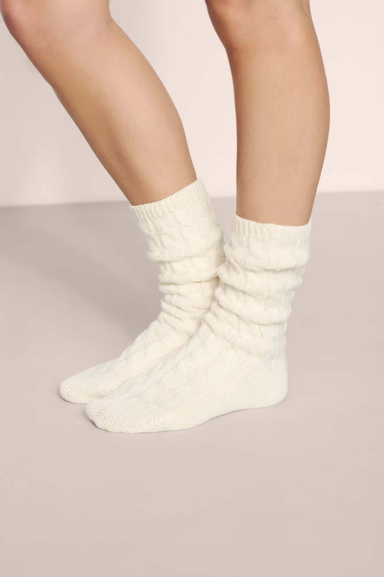 Model is wearing Cozy Socks in Ivory