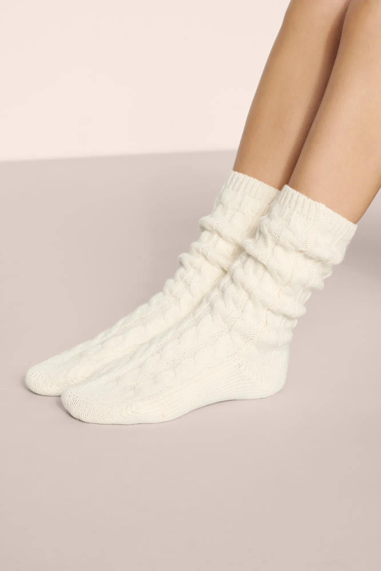 Model is wearing Cozy Socks in Ivory