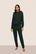 Model is wearing Recycled Boucle Relaxed Fit Jogger  in Pine