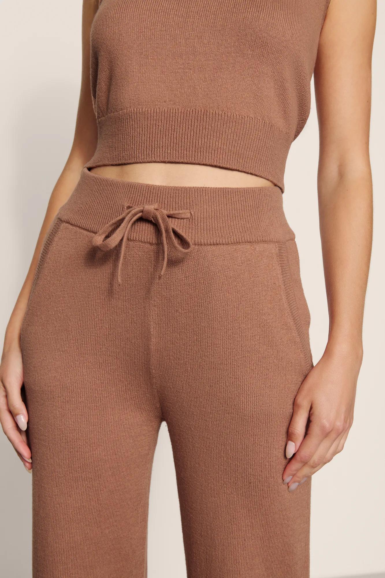 Model is wearing Recycled Sweater Pant  in  Hazelnut