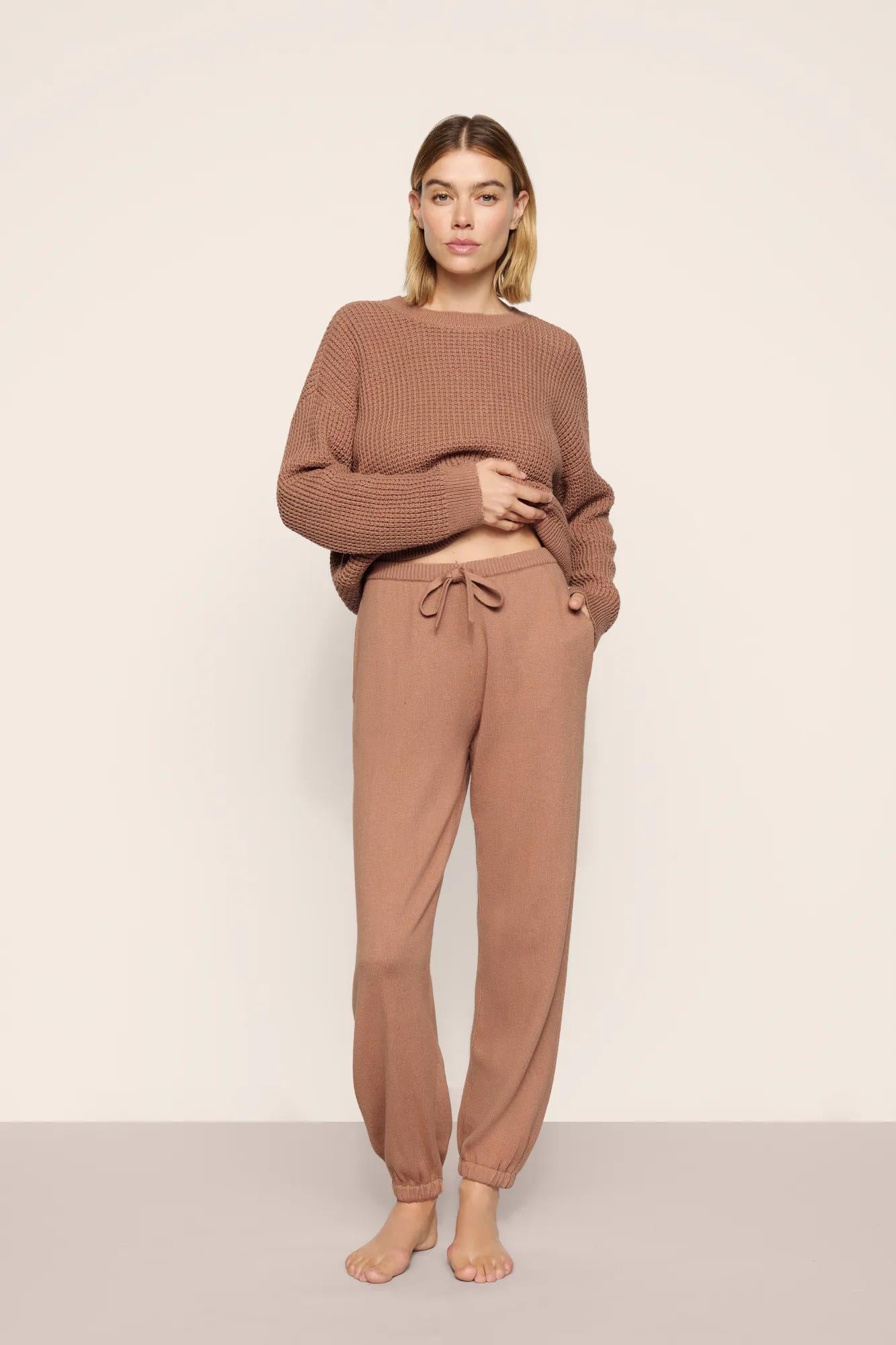 Model is wearing Recycled Sweater Slouchy Pant  in  Hazelnut