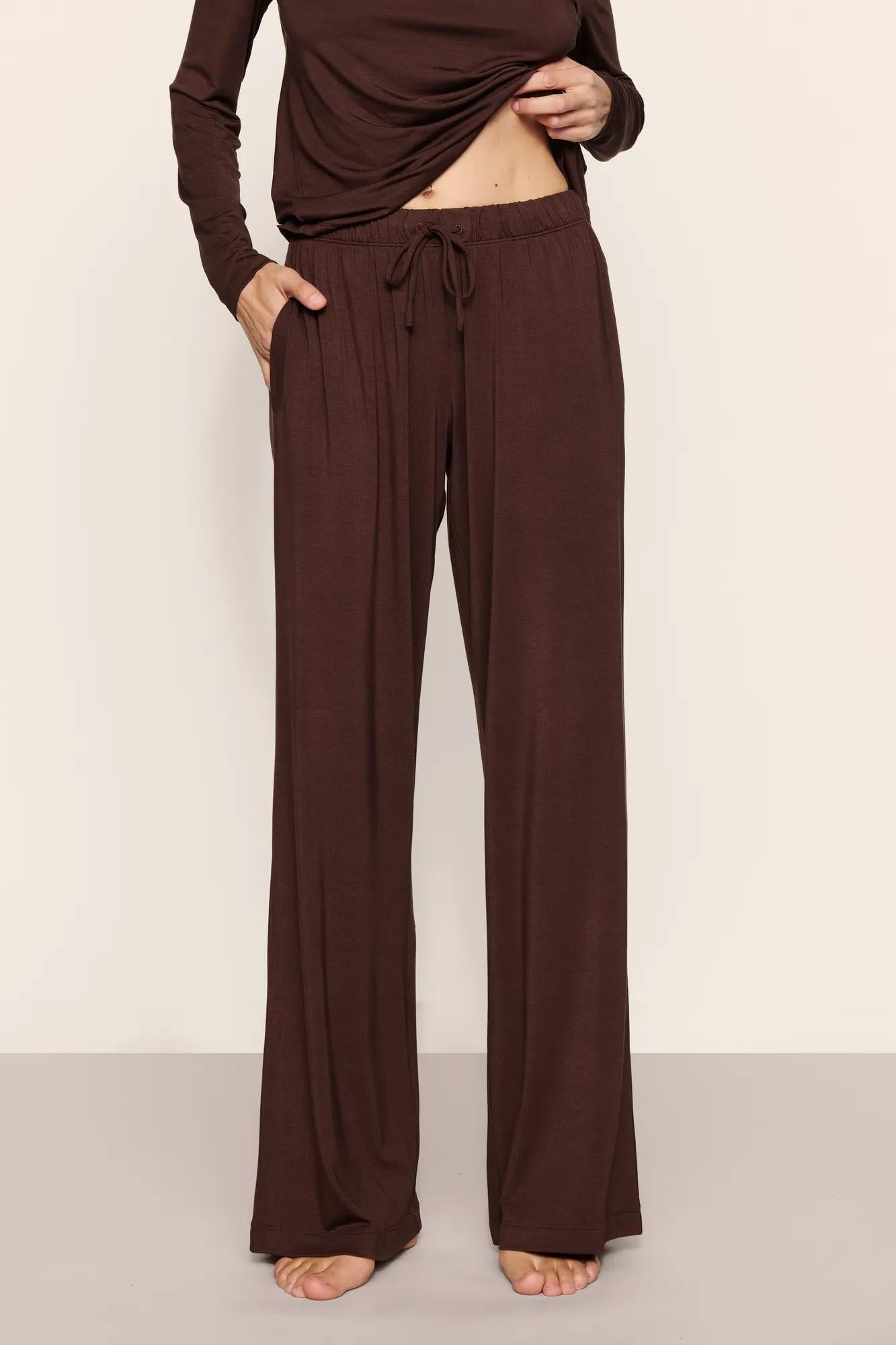 Model is wearing Gisele TENCEL™ Modal Everyday Straight Leg Pant in Chocolate