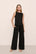 Model is wearing Organic Linen Knit High Waisted Pant in Black
