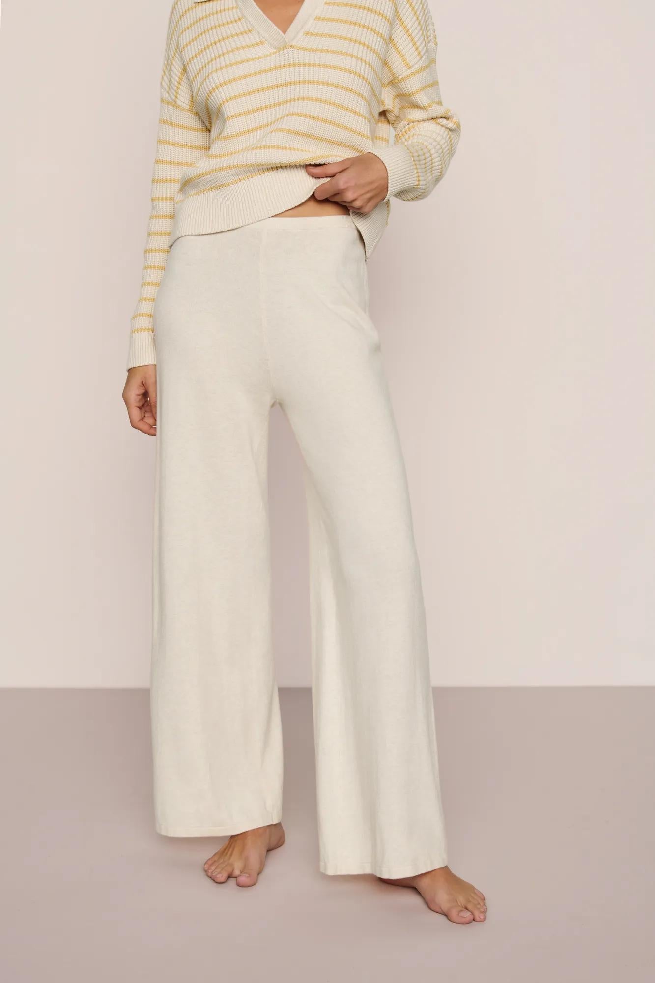 Model is wearing Fine Gauge Sweater Pant in Almond Heather
