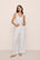 Model is wearing Linen Blend Relaxed Pant in White